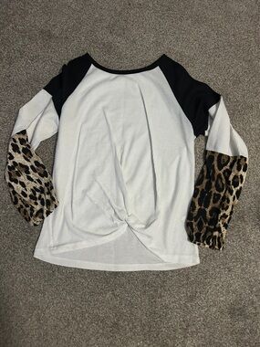 Long Sleeve White Knit Top with Black Shoulders and Leopard Sleeves